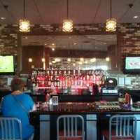 Foto diambil di Grind Burger Bar &amp;amp; Lounge oleh Pat H. pada 8/11/2012