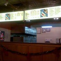 Photo taken at Phil&amp;#39;s Pizza by CjAy on 12/18/2011