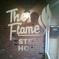Photo taken at The Flame Steakhouse by MB on 6/12/2012