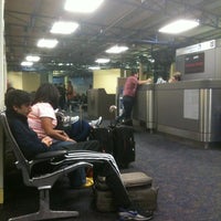 Photo taken at Gate 67B by Carlos C. on 4/8/2011