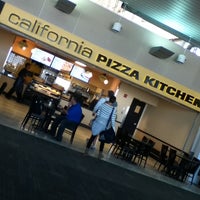 Photo taken at California Pizza Kitchen by Brittany M. on 2/18/2012