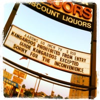 Photo taken at Sav-Mor Liquors by Stacey G. on 7/14/2012