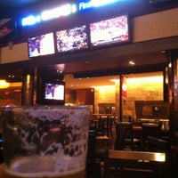 Photo taken at Stadium Sports Bar &amp;amp; Grill by Patrick L. on 3/15/2012