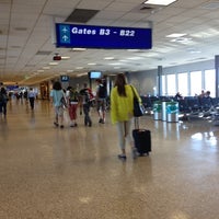 Photo taken at Concourse F by Adam M. on 9/5/2012