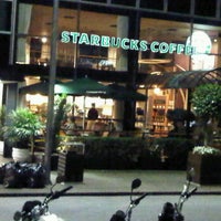 Photo taken at Starbucks by Juliana G. on 9/22/2011