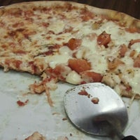 Photo taken at Mama Carmela&#39;s Pizza by Axel M. on 5/6/2012