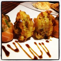 Photo taken at Sushi-Go by Erika M. on 8/23/2012