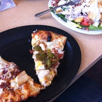 Photo taken at Round Table Pizza by Cynthia N. on 1/19/2012