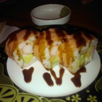 Photo taken at Sushi Train by Emily l. on 8/21/2011