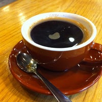 Photo taken at Seattle Coffee Works by Ann J. on 10/11/2011