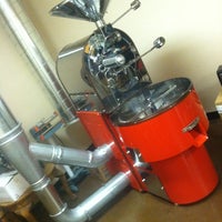 Photo taken at Vogava Coffee Roasters by Chris C. on 10/7/2011
