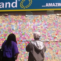 Photo taken at Peckham Peace Wall by Jamie Z. on 8/14/2011