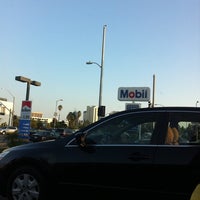 Photo taken at Mobil by Calysta on 9/15/2011