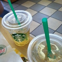 Photo taken at Starbucks by Tasha F. on 5/30/2012