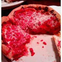 Photo taken at Dish Famous Stuffed Pizza by Amy G. on 8/4/2012