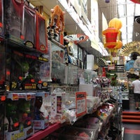 Photo taken at Far East Flea Market by Andrew E. on 7/11/2012