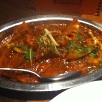 Photo taken at Saffron Indian Cuisine by Sarah L. on 3/16/2011