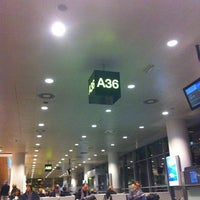 Photo taken at Gate A36 by Denise M. on 3/4/2012