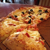 Photo taken at Tashir Pizza by Mike W. on 4/2/2012