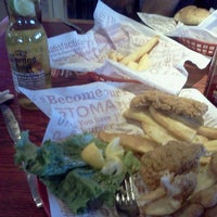 Photo taken at Red Robin Gourmet Burgers and Brews by Jaysen C. on 5/19/2012