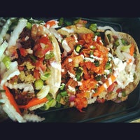 Photo taken at Kimchi Taco Truck by Chelle . on 3/21/2012