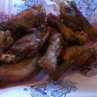Photo taken at Cousin Vinnie&amp;#39;s World Famous Chicken Wings by Christina E. on 8/26/2012