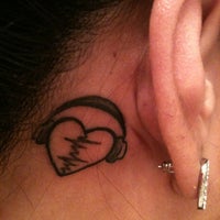 Photo taken at Tattoo Lounge by Xtina C. on 8/11/2012