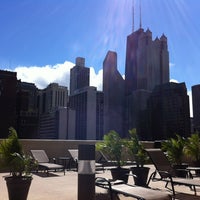 Photo taken at Pool Deck @ 1133 N. Dearborn by Amanda F. on 9/9/2012