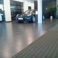 Photo taken at Спорткар-Центр Porsche by Андрей А. on 8/22/2012