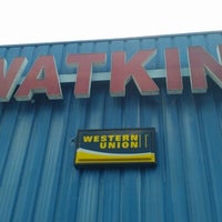 Photo taken at Watkins by Alex G. on 6/24/2012