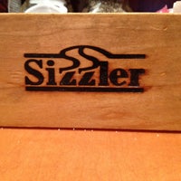 Photo taken at Sizzler by Ryan E. on 3/4/2012