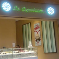 Photo taken at La Cupcakeria by Adrian S. on 3/18/2012