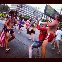 Photo taken at 2012 Peachtree Road Race by Devan L. on 7/4/2012