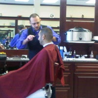 Photo taken at Gino&amp;#39;s Classic Barber Shoppe by Vlad G. on 5/7/2011