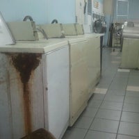 Photo taken at Van Nuys Coin Laundry by Amanda B. on 12/22/2011