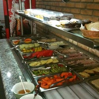 Photo taken at Pizzaria Zona Sul by Gabriela A. on 11/28/2011
