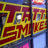 Photo taken at Desire Tattoo &amp;amp; Smoke Shop by Vin A. on 3/25/2011