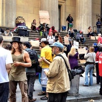 Photo taken at Occupy Wall Street by Lane B. on 4/16/2012