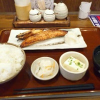 Photo taken at 焼魚食堂 魚角 大久保店 by Masato M. on 10/5/2011