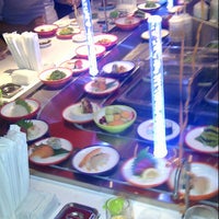 Photo taken at Yo! Sushi by Brendan K. on 7/24/2012