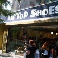 Photo taken at Tip Top Shoes by Lester W. on 6/20/2011