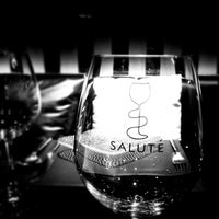 Photo taken at Salute Bistro &amp;amp; Wine Bar by Pae W. on 1/30/2012