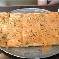 Photo taken at Basilicos Pizzeria by Renee F. on 8/12/2012