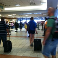 Photo taken at Concourse E by Walker L. on 7/1/2012