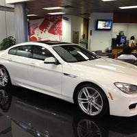 Photo taken at Momentum BMW by Dre D. on 6/30/2012