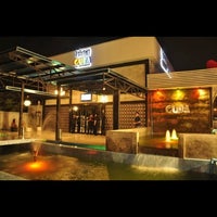 Photo taken at GUBA Pub &amp;amp; Restaurant by Napasin K. on 2/8/2012