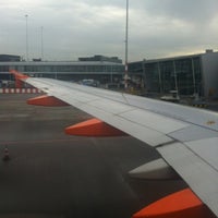 Photo taken at EasyJet Check-in by Tess S. on 8/28/2012