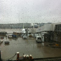 Photo taken at Gate D63 by Vika S. on 5/21/2012