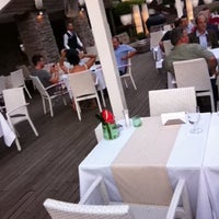 Photo taken at The Rafine Restaurant by Suat Y. on 7/19/2011