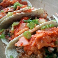 Photo taken at Kimchi Taco Truck by Mike W. on 9/3/2011